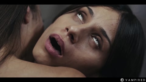 Lesbian Vampire Mesmerizes Partner in Intimate Encounter