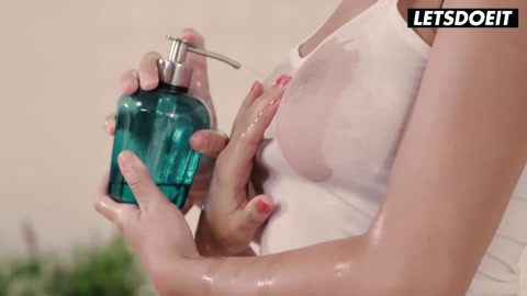 Brunette receives sensual oil massage with top removed